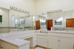 The spacious Master bath has dual vanity and ample counter space
